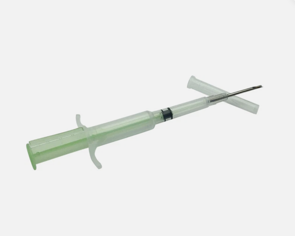 Microchip injector syringe — the chip is about the size of a grain of rice